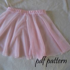 a pink skirt is laying on a white sheet with the words, pattern below it