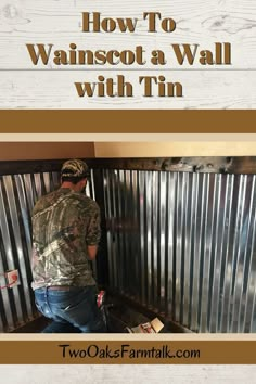 a man standing in front of a metal fence with the words how to wanscot a wall with tin