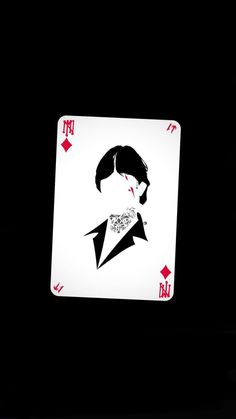 a playing card with the image of a man's face in black and white