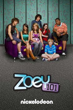 the cast of zoo 101 sitting on a purple couch in front of a green wall