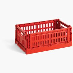 a red plastic crate on a white background