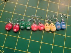 M&M faces in bright colors 3 orange 2 blue 1 green and 2 red Playful Personalized Multicolor Earrings, Playful Multicolor Personalized Earrings, M&m Characters, Bright Colors, Etsy Earrings, Dangle Drop Earrings, Orange, Drop Earrings, Green