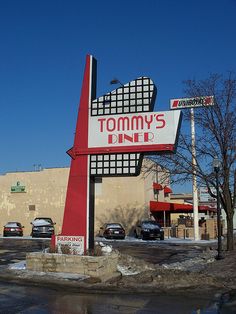 there is a large sign that says tommy's diner