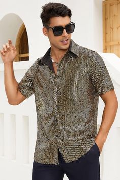 a man wearing sunglasses and a shirt