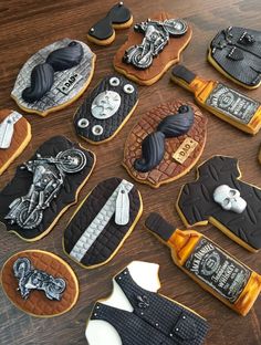 decorated cookies are laid out on the table to look like motorcyclist's gear