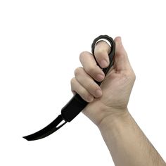 a hand holding a large black object in it's right hand, with the handle extended