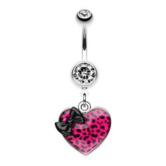 a pink and black heart shaped belly ring with a bow tie on the end,