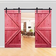 an open red barn door in a living room