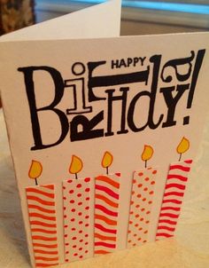 a happy birthday card with candles on it