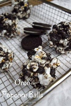 oreo popcorn balls are on a cooling rack