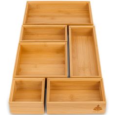 four bamboo trays stacked on top of each other