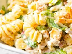 a bowl filled with pasta and chicken salad