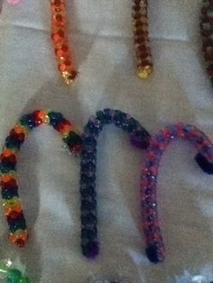 there are many beads that spell out the word pisc