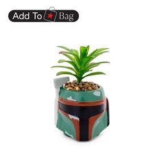 a small potted plant with a star wars helmet on it's side and the words, add to bag