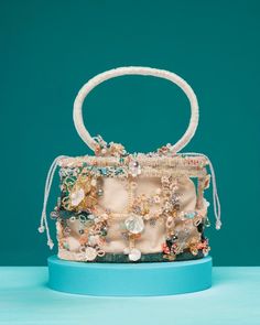 "Fully beaded, large handbag cage with linen liner. Adorned with beads, druzy, pearls and rosettes. Dimensions: 8.5\" width, 6\" height, 10\" height (with handle)" Cage Purse, Iridescent Fabric, Large Handbag, Woven Handbags, Handcrafted Bags, Large Handbags, Flower Studs, Clutch Handbag, Druzy