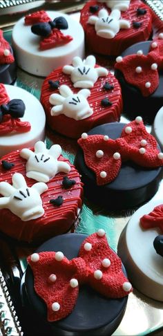 mickey mouse cupcakes with red and white frosting