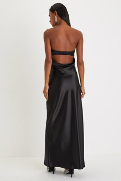 You'll be the classiest invite of the night in the Lulus Exquisite Shine Black Satin Rhinestone Strapless Maxi Dress! Sleek woven satin shapes this luxurious dress that features a strapless bodice with a rhinestone-trimmed sweetheart neckline (with hidden no-slip strips) that peaks out from a cute foldover detail. The figure-flattering slip silhouette falls to an elegant maxi hem. Hidden side zipper/clasp. Fit: This garment fits true to size. Length: Floor length. Size medium measures 52.25" from top to bottom. Bust: Great for any cup size. Waist: Fitted - very fitted at natural waist. Hip: Loosely Fitted. Undergarments: May be worn with an adhesive bra, petals, or no bra. Fabric: Fabric has no stretch. Lined. Shell: 97% Polyester, 3% Spandex. Lining: 95% Polyester, 5% Spandex. Exclusive O Black Satin Strapless Gown, Black Long Dresses Formal, Black Silk Bridesmaid Dress, Sparkly Black Prom Dress, Strapless Black Prom Dress, Black Formal Dress Long, Black Tie Dresses Formal, Black Satin Prom Dress, Black Long Dresses