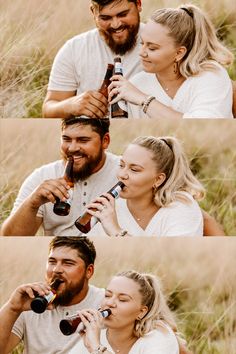 a man and woman sitting next to each other drinking from bottles in the grass with their mouths open