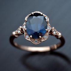 blue sapphire engagement ring halo vintage inspired in white gold Oval Halo Engagement Ring, Feel Powerful, Vintage Inspired Engagement Rings, Engagement Rings Vintage Halo, Sapphire Rings, Engagement Ring Vintage, Sapphire Engagement Ring Blue, Dream Engagement Rings, Simple Dress