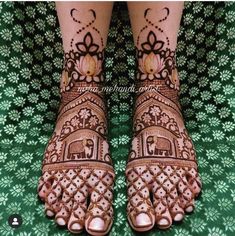 the feet are decorated with henna and flowers