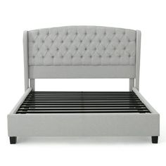 the bed frame is upholstered with tufted headboard and foot board measurements