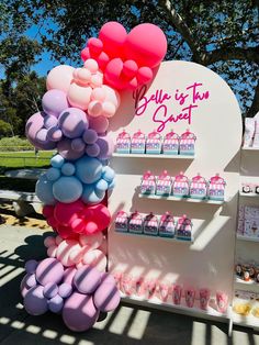 there are many balloons on display in the store