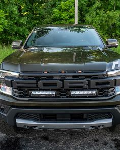 the front end of a black pickup truck