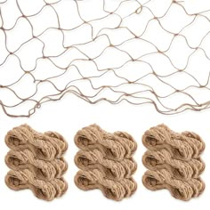 three balls of jute twine sitting next to each other