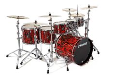 a red and black drum set on a white background