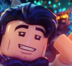 the lego movie character is wearing a bow tie