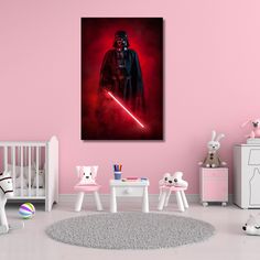 a child's room with pink walls, white furniture and a star wars poster on the wall