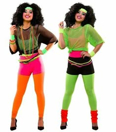 two women dressed in bright colored clothing posing for the camera with their hands on their hipss