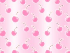 a pink background with cherries on it