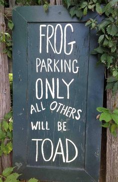 a sign that says frog parking only all others will be toad