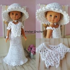 the doll is wearing a white crochet dress and hat with matching bib