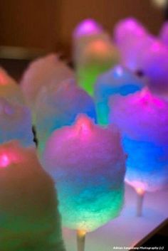 there are many marshmallows with colored lights on them