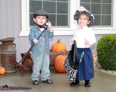 two children dressed up in halloween costumes standing on the front porch with their pumpkins