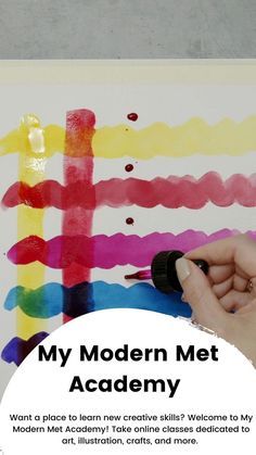 a person is using a marker to paint on a piece of paper with the words, my modern met academy