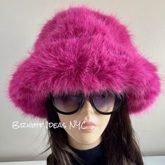 "Fun, stylish and warm Fluffy Fuzzy Luxury Faux Fur Vegan Bucket Hat that makes the perfect accessory. Vegan Super comfy 23\" circumference Quilted Lining Bright Pink Adjustable drawstring To view the rest of our collection, please visit: brightideasnyc.com" Fluffy Faux Fur Hat For Fall, Fluffy Faux Fur Hat For Cold Weather, Trendy Faux Fur Winter Hat, Trendy Winter Faux Fur Hat, Faux Fur Beanie For Cold Weather, Cold Weather Faux Fur Beanie, Trendy Winter Hats With Faux Fur Lining, Trendy Brimmed Cloche Hat For Winter, Trendy Mini Bucket Hat For Winter