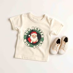 "Your toddler will look adorable in this \"BETTER NOT POUT\" Skeleton Toddler short sleeve tee. This lightweight side-seamed shirt maximizes comfort all day long.  Funny Christmas Toddler Shirt, You Better Not Pout Santa Toddler Tee, Retro Santa Distressed Tee, Cute Natural Christmas Shirt, Xmas Gifts, Christmas shirt, Christmas Gifts, Funny Christmas tshirts, Better Not Pout Crewneck Sweatshirt, Christmas Movie Season Toddler T shirts, Christmas Shirt, Holiday Season Shirts, Cute Toddler Christ Holiday Tops With Funny Print And Short Sleeves, Better Not Pout, Cute Holiday T-shirt With Short Sleeves, Kids Christmas Tee Shirts, Toddler Christmas Shirts Boy, Toddler Christmas Shirts Girl, Toddler Christmas Shirts Zazzle, Dear Santa Toddler Shirt, Toddler Christmas Shirt