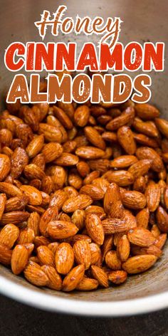 honey cinnamon almonds in a bowl with text overlay that reads honey cinnamon almonds