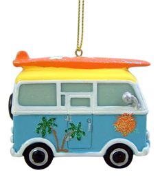 an ornament shaped like a van with a surfboard on top