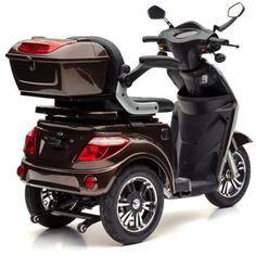 a scooter is shown with the back seat folded up and it's cargo compartment open