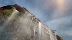 the sun shines brightly through the clouds in the sky above a water slide at an amusement park