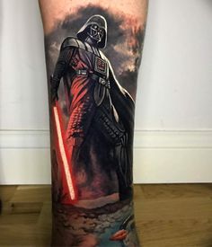 a man's leg with a star wars tattoo on it and a darth vader