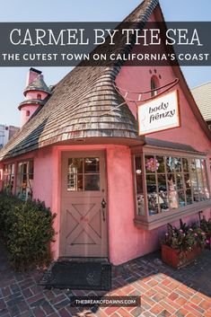 a pink building with the words carmel by the sea on it