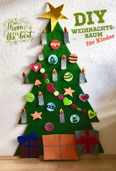 a christmas tree made out of felt and paper