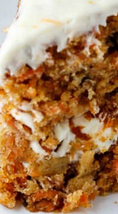 a piece of carrot cake with cream cheese frosting