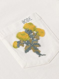 BODE's T-shirt is influenced by traditional tablecloths from the '50s. It’s made from cotton-jersey and has the logo and a bouquet embroidered on the chest patch pocket. Bode Embroidery, Bode Shirt, Print Techniques, Cuban Shirts, Pocket Tee Shirts, Embroidery Shirt, Patches Shirt, Creative Services, White Shoes Sneakers