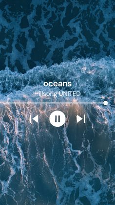 an aerial view of the ocean with waves and music player on it's screen